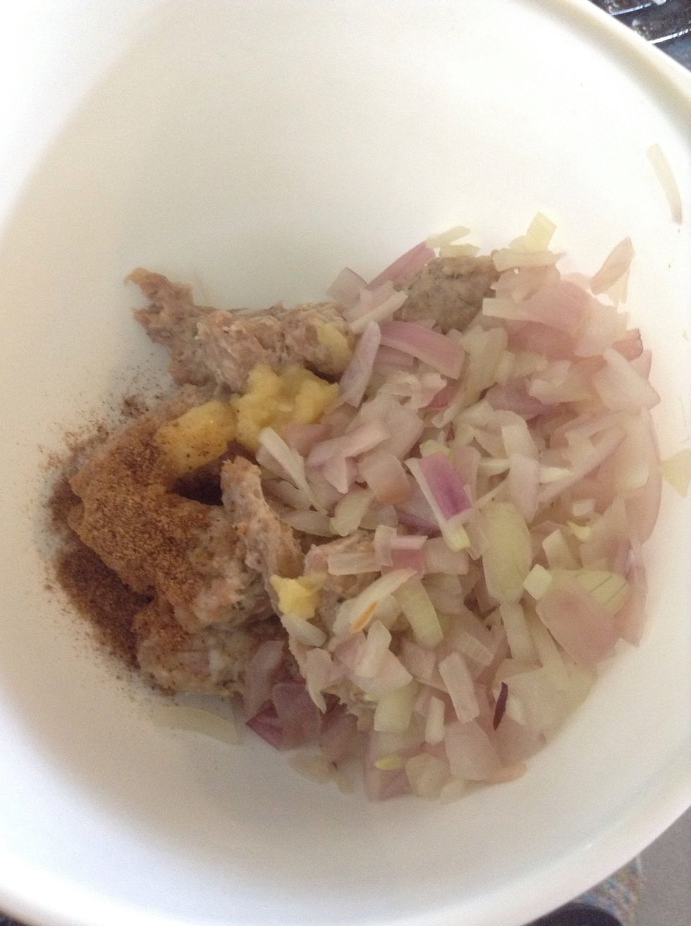 Add the seasoning, onions and garlic to sausage meat ( this is where you can add breadcrumbs)