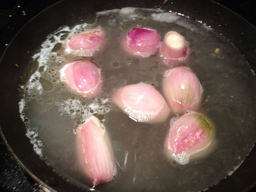 Add the Shallots to the pot and add enough water to cover them.