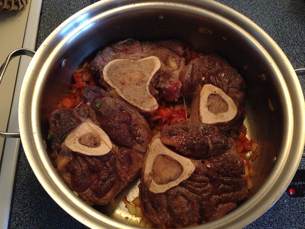 Add the shanks over the veggies