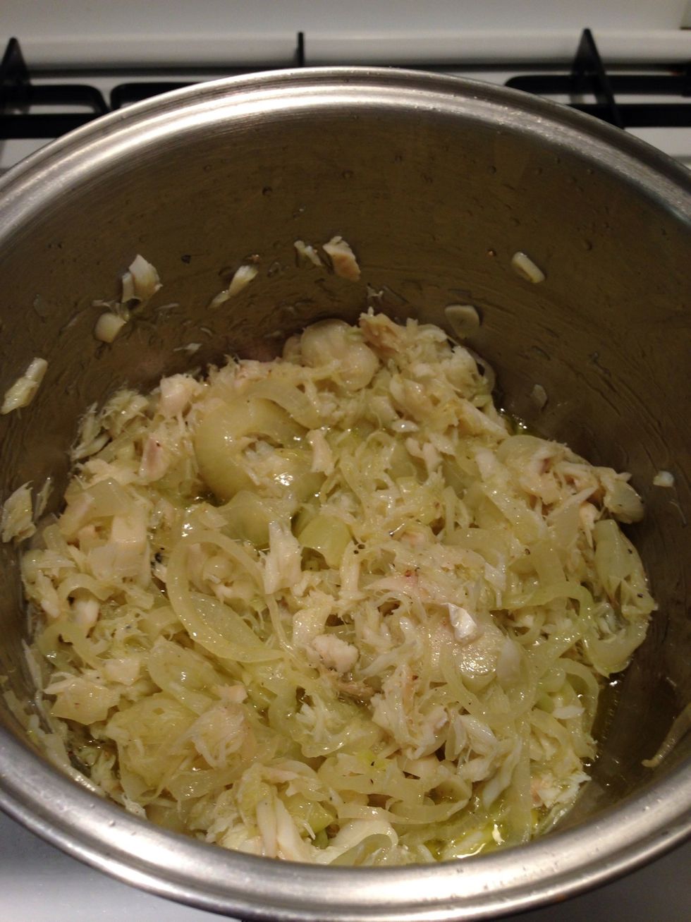 Add the shredded codfish and mix well