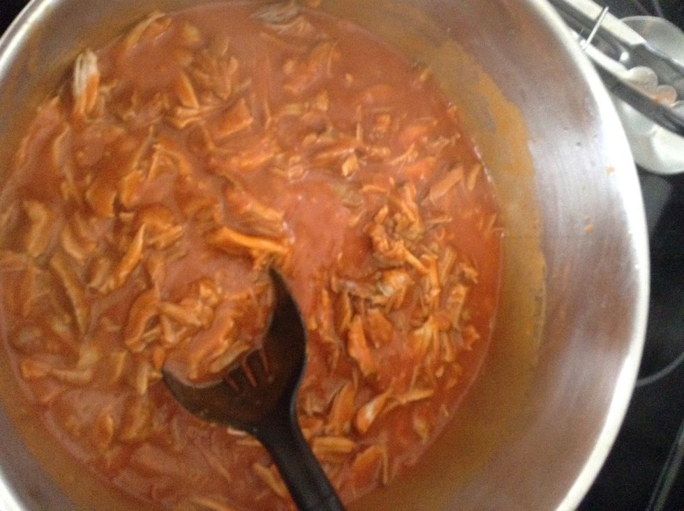 Add the shredded meat...after I added the meat it was way too thick so I added more of the water to it and kept stirring.