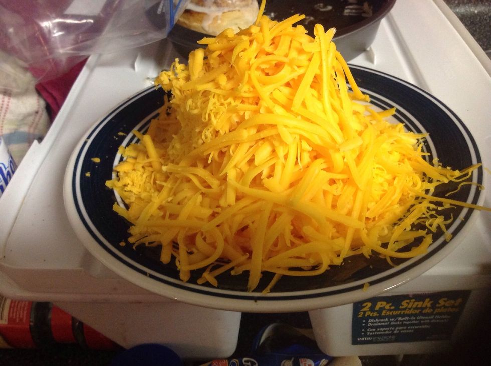 Add the six cups of cheese....better to grate your own cheese because shredded cheese starch on it.... But which ever you prefer....