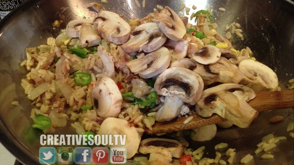 Add the sliced mushrooms.