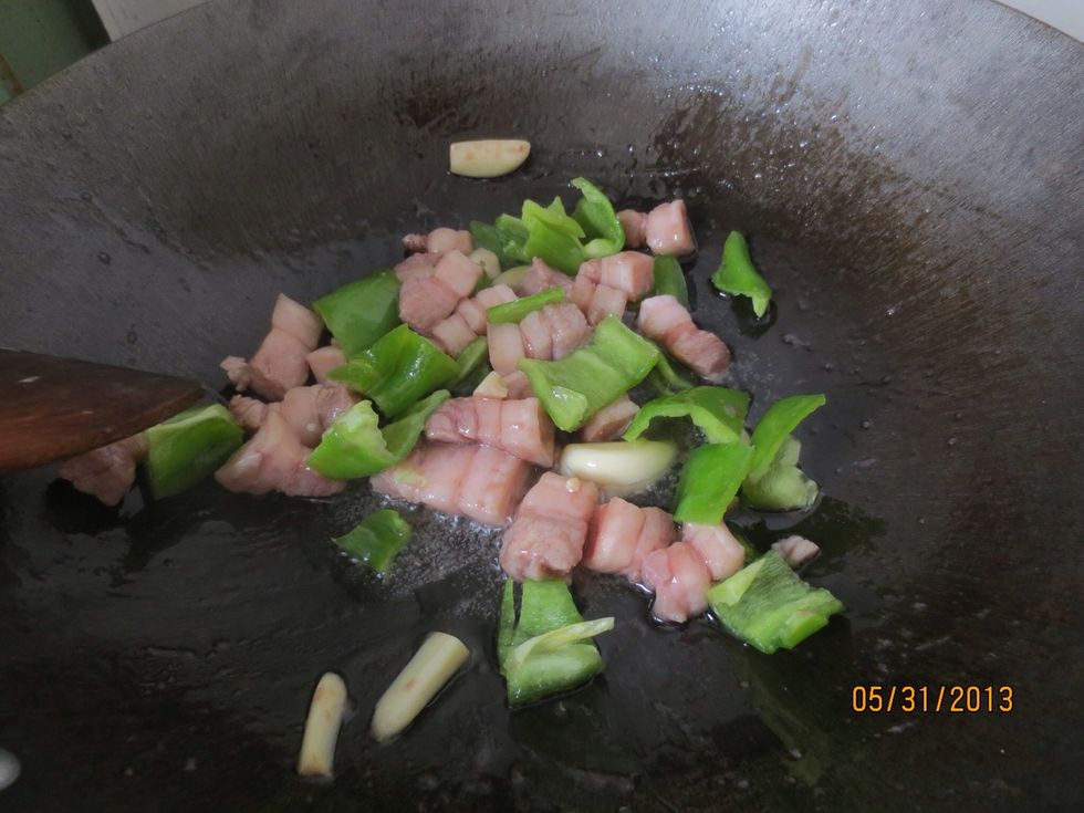 Add the sliced peppers