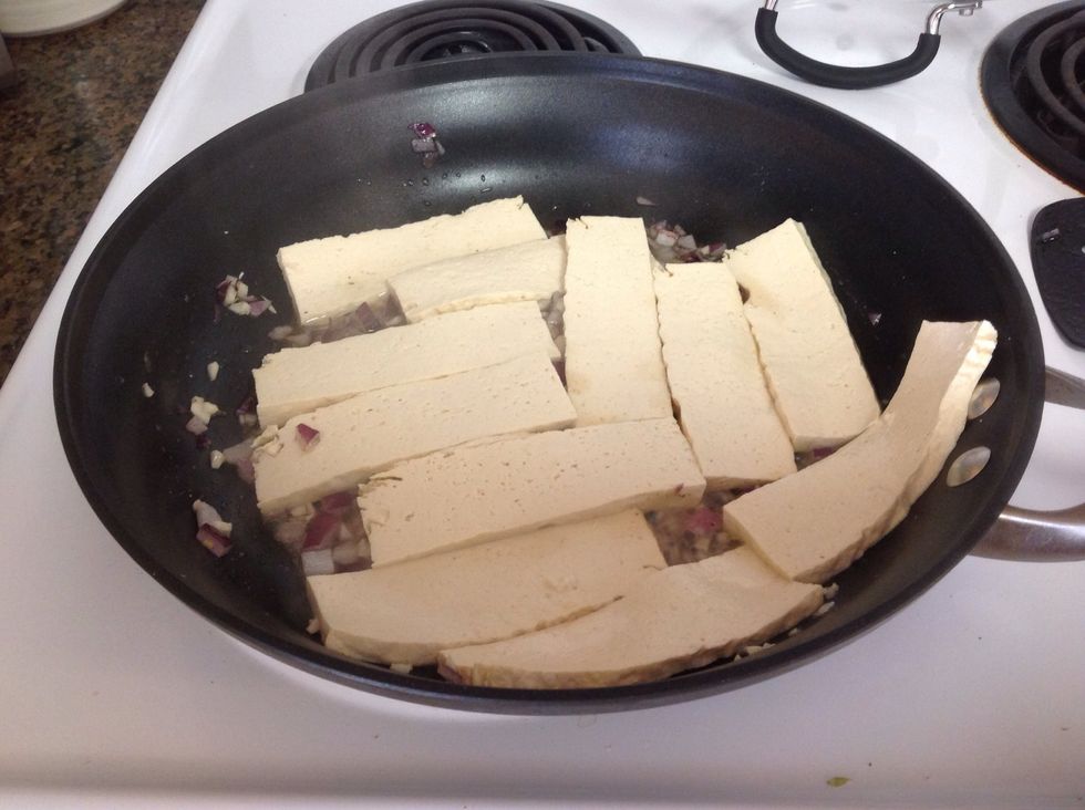 Add the sliced tofu.  Saut\u00e9 for about 3 min or until the pan is dry.