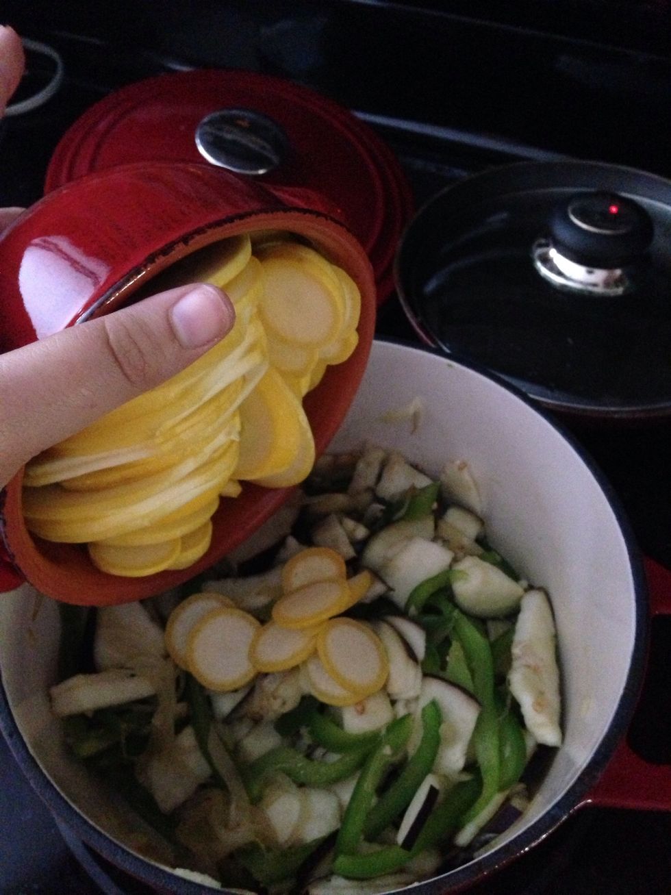 Add the sliced veggies.