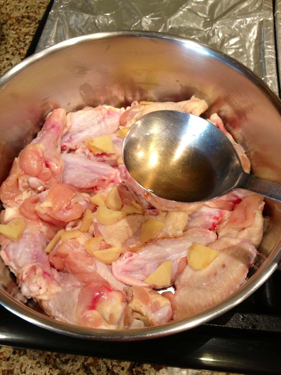 Add the slices of Ginger to the pot and add 2 spoonfuls of Vinegar.
