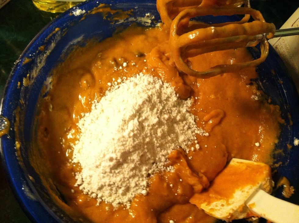 Add the small bowl of dry ingredients and beat the mixture until combind