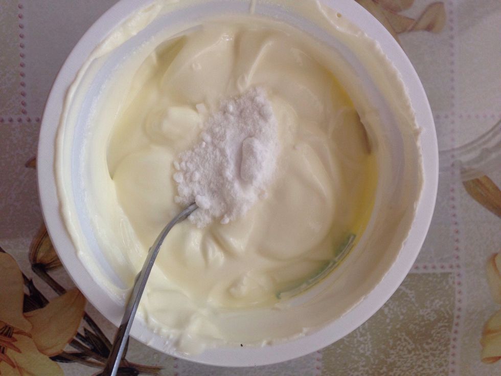 Add the soda into the sour cream