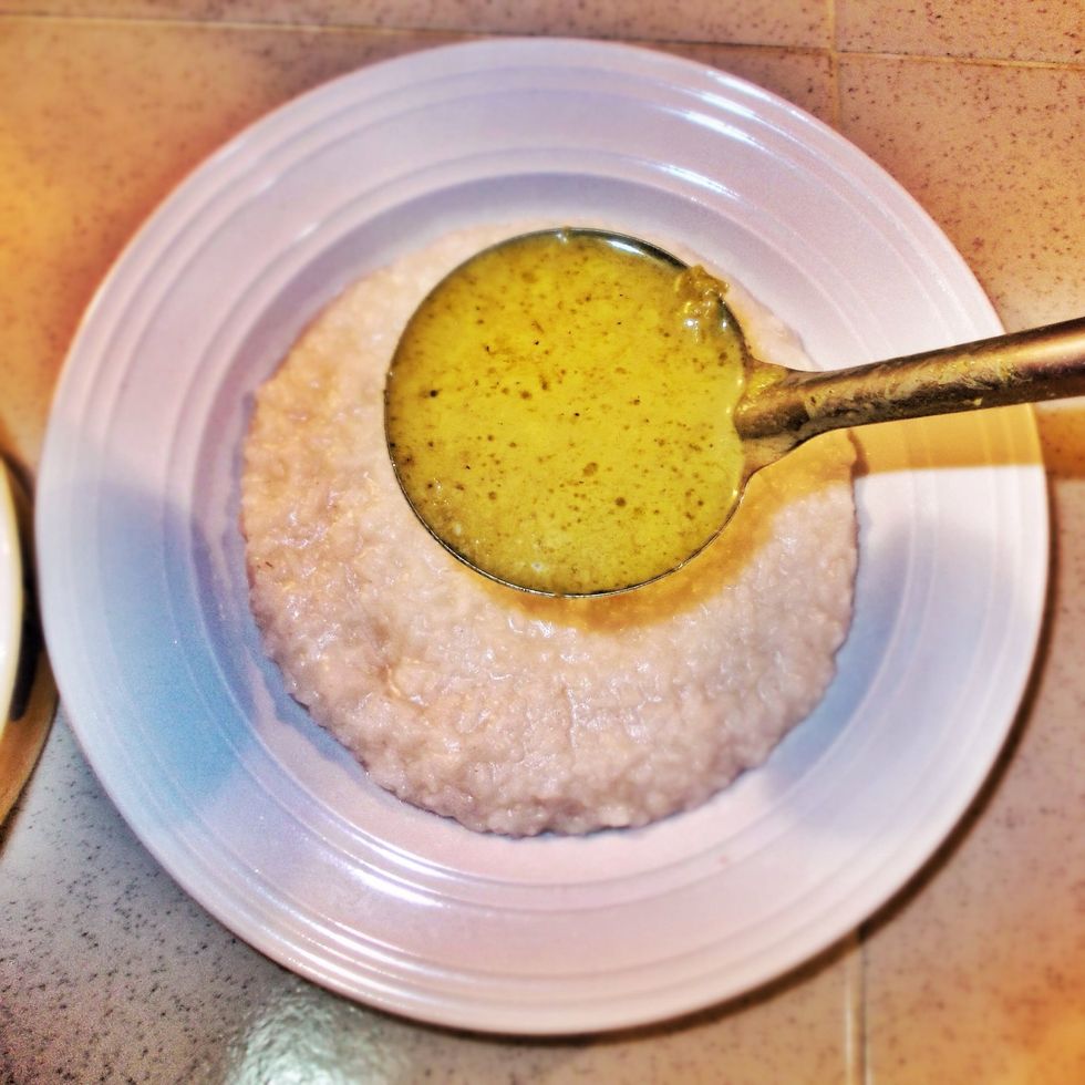 Add the soto soup over the porridge.