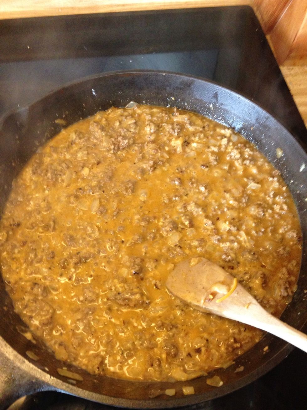 Add the soy sauce, Worcestershire sauce, broth and cheese. Stir until it makes a sauce.