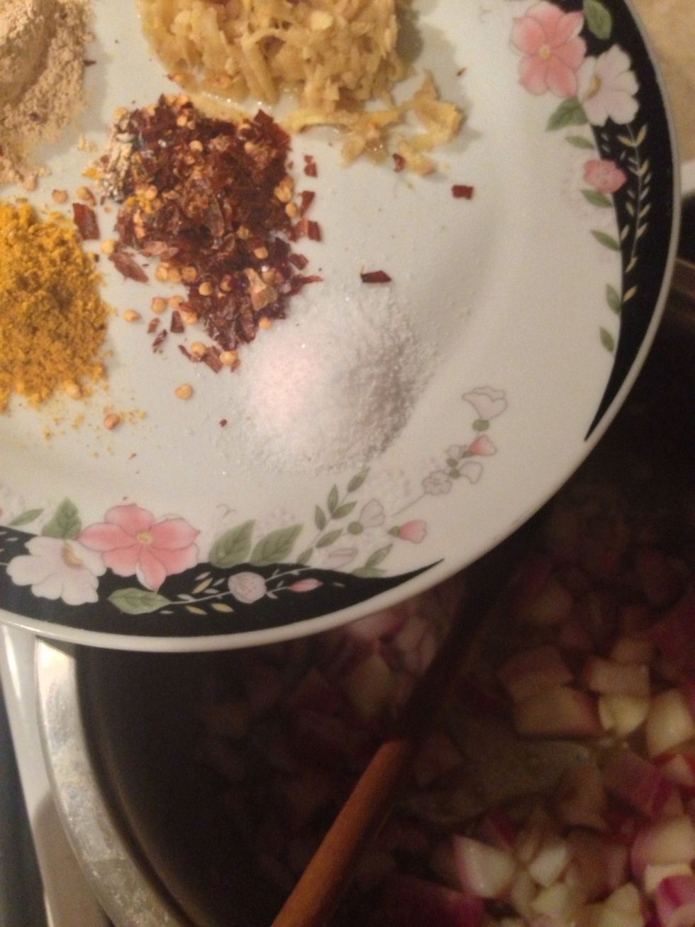 Add the spices and the minced garlic.