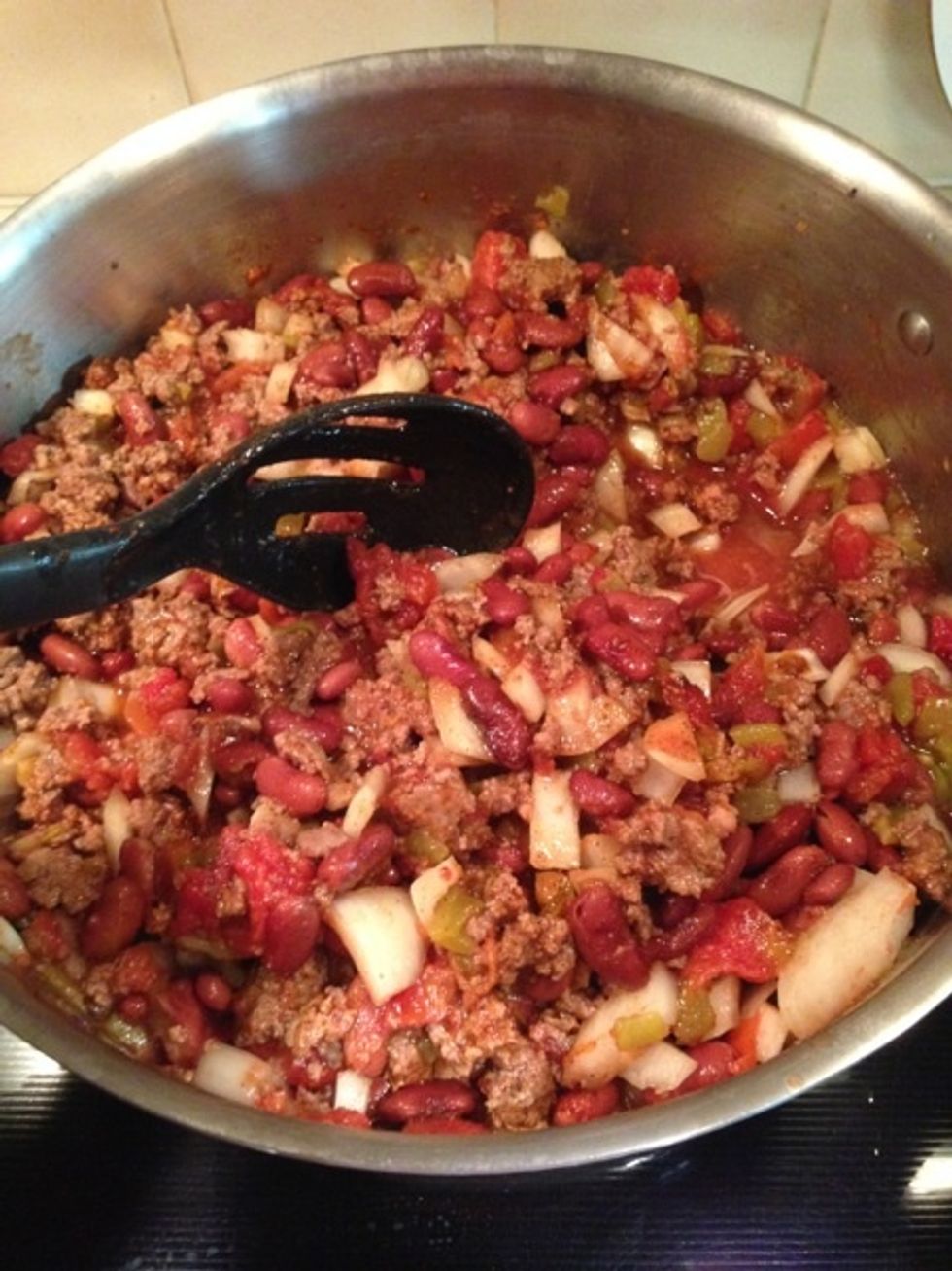 Add the spices, mix, then reduce heat to low and simmer, at least 30 minutes or until the vegetables soften and the flavors combine. Stir frequently.