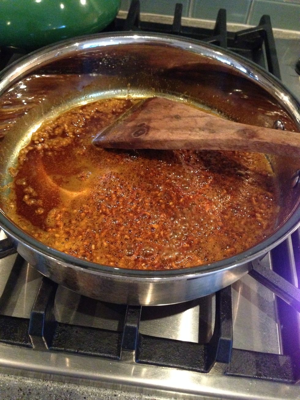 Add the spices mixture to the oil and garlic and stir for 1 minute while on low heat.