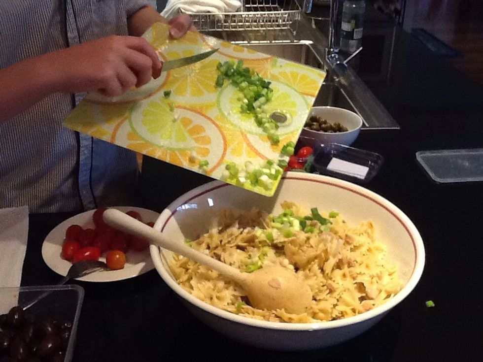 Add the spring onion into the bowl