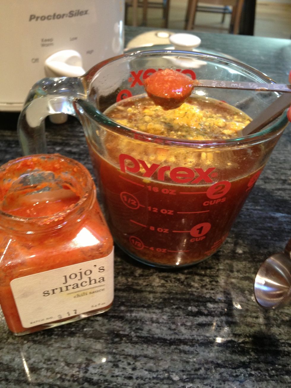 Add the sriracha, then stir to combine. Either store in an airtight container, or put aside for a moment.