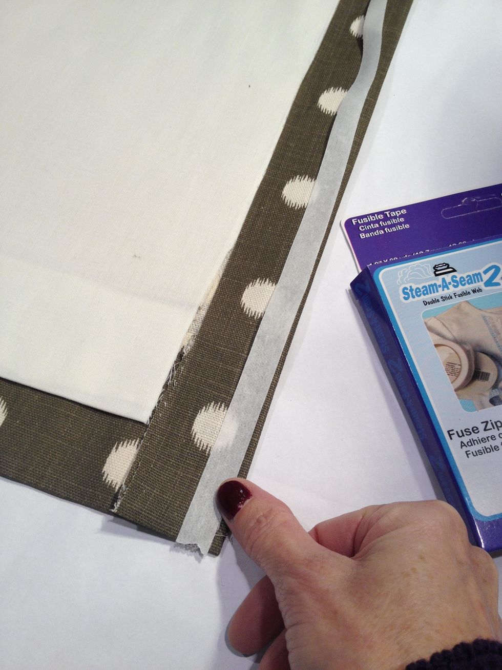 Add the Steam-A-Seam 2 and press in place. Remove the paper backing from the Steam-A-Seam.