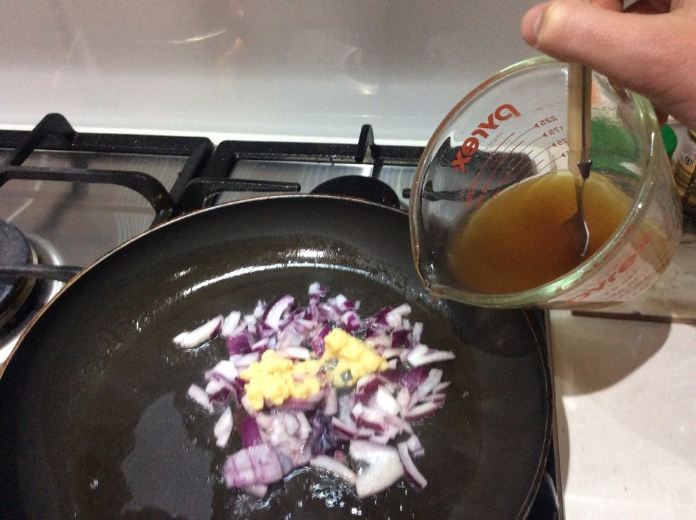 Add the stock and bring to the boil. Cook for 2 minutes or until stock reduces by half.
