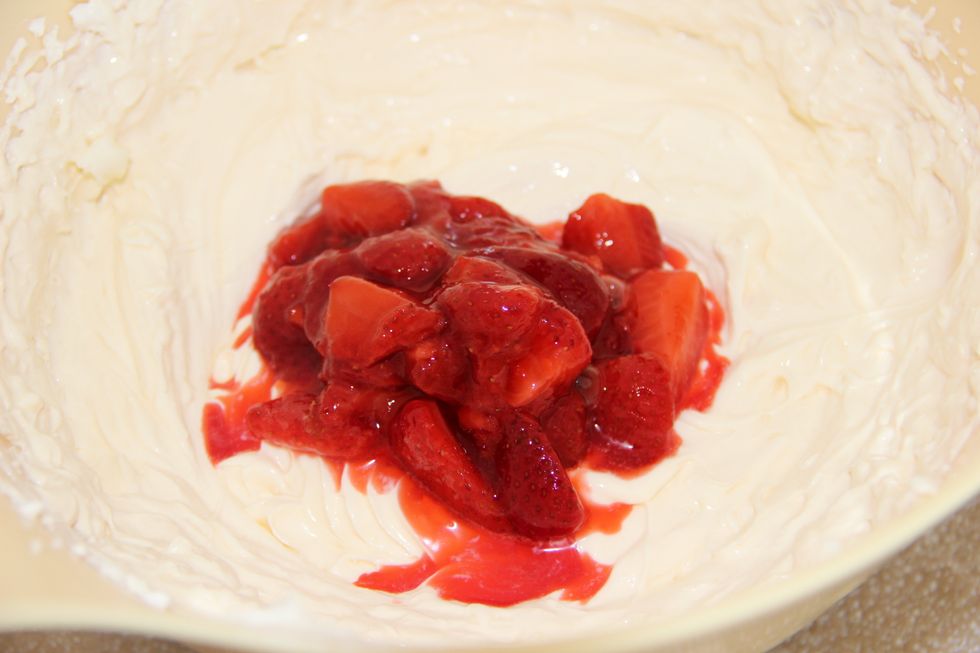 Add the strawberries and stir gently by hand