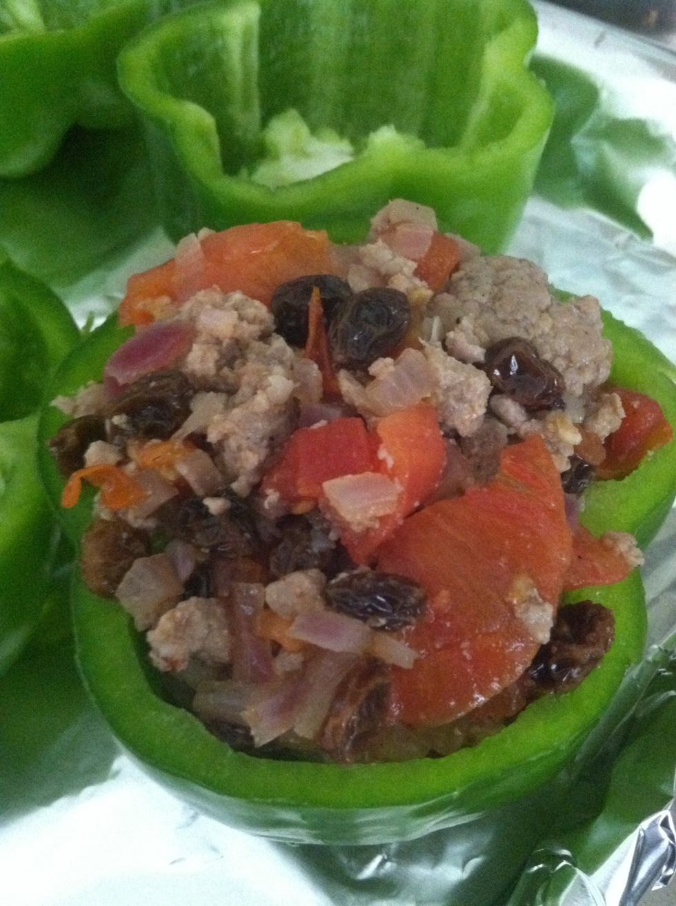 Add the stuffing in the green peppers. Then place it on the oven, 350 F  for 30 minutes.
