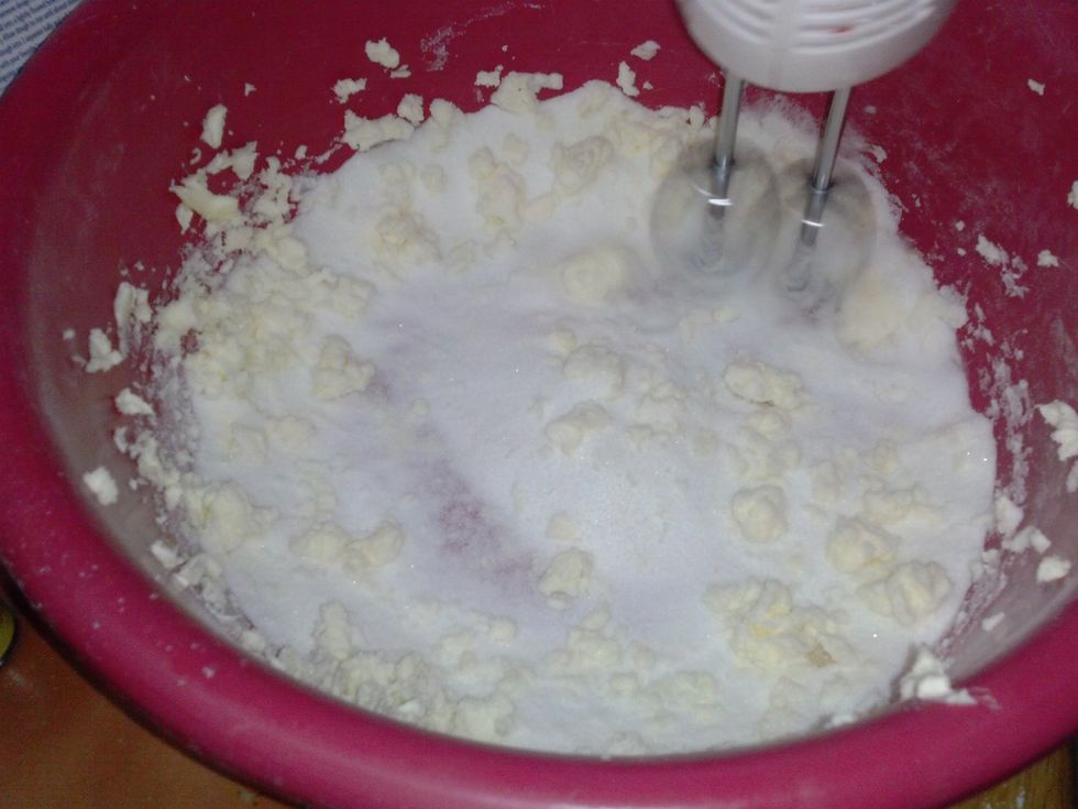 Add the sugar and beat till it gets soft.