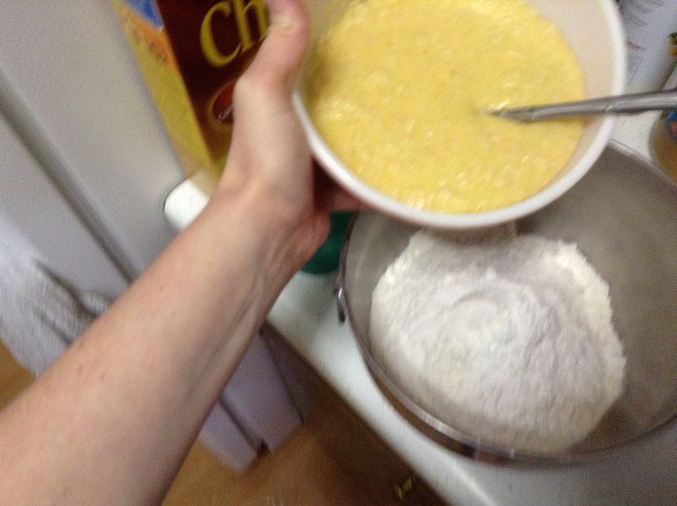 Add the sugar and egg mixture to the four bowl