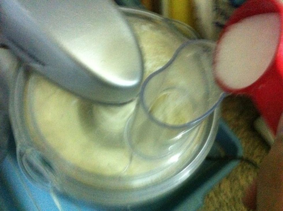 Add the sugar through the feed tube