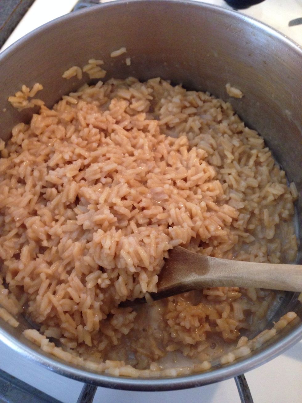 Add the sugar to 2 cups of rice milk and heat slightly to dissolve. Then add milk solution to rice. Stir in the salt.