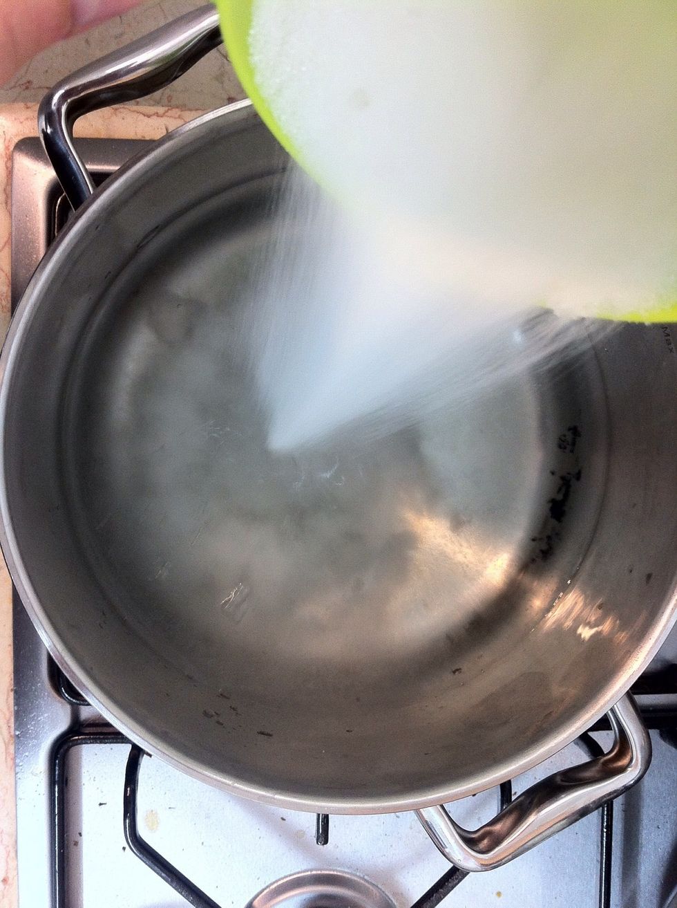 Add the sugar to the water and let it boil