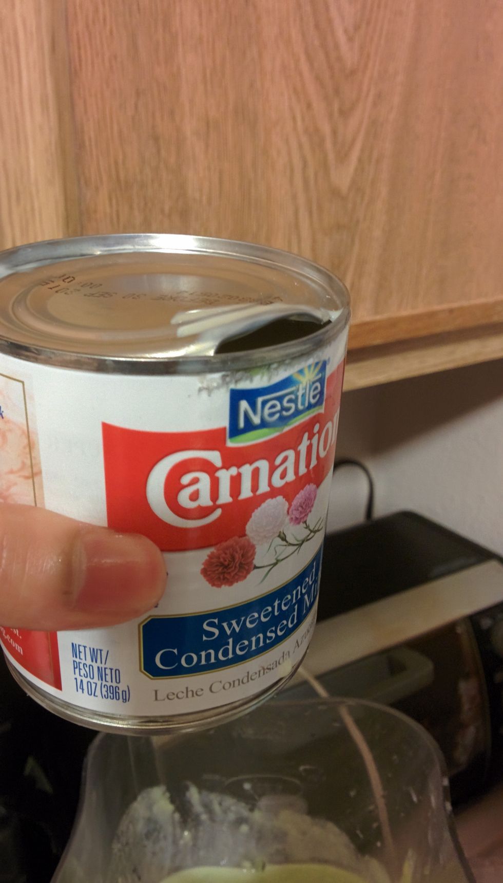 Add the sweetened condensed milk into the blender as well. Like I mentioned under supplies, 2 teaspoons should be enough for 1 glass of this smoothie.
