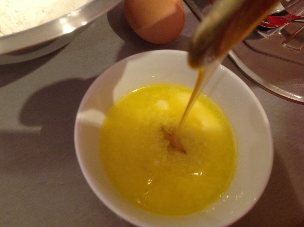 Add the tablespoon of honey into the bowl of butter.