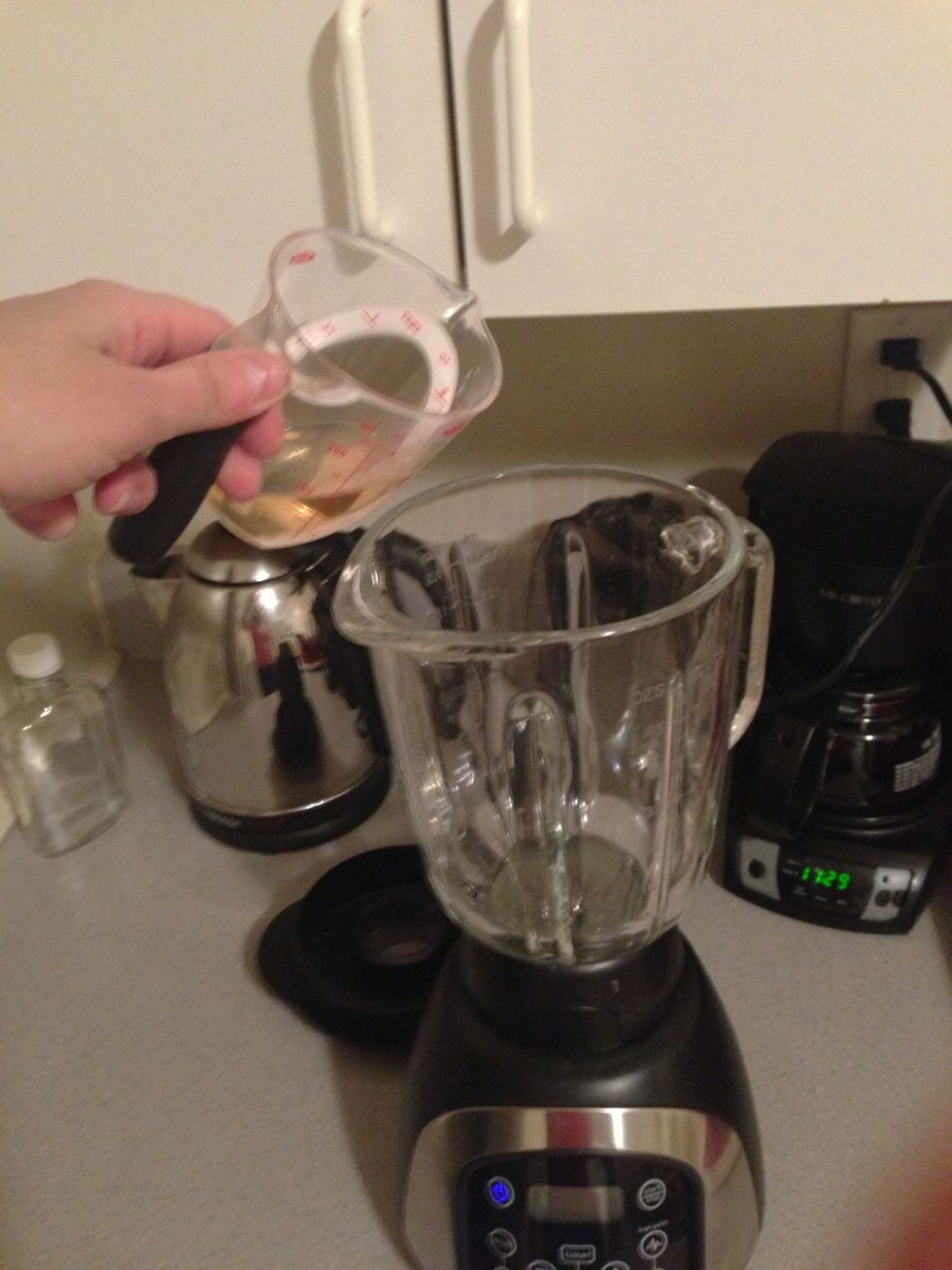 Add the tequila to a blender.