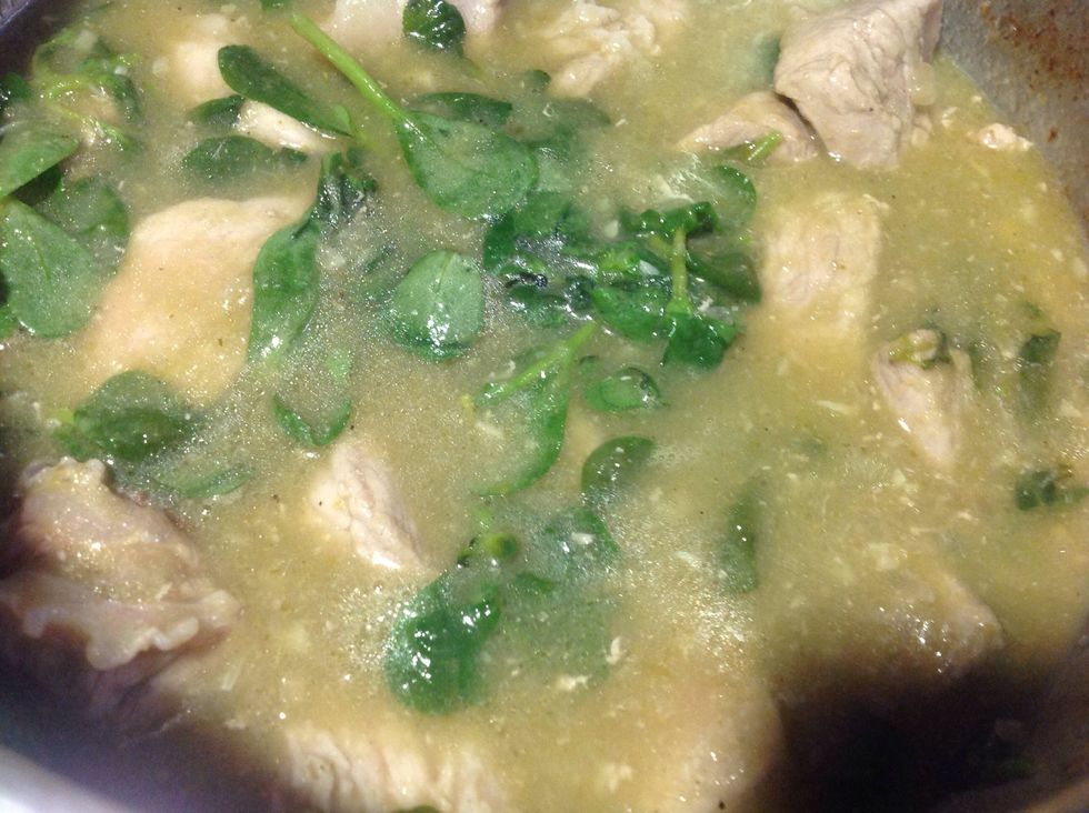 Add the tomatillo broth. (Broth) On a pan, get the chicken stock, tomatillo, onion, garlic, and the chillies, let it boil, once it's cook blended, put it back in the pan and boil it again, season it