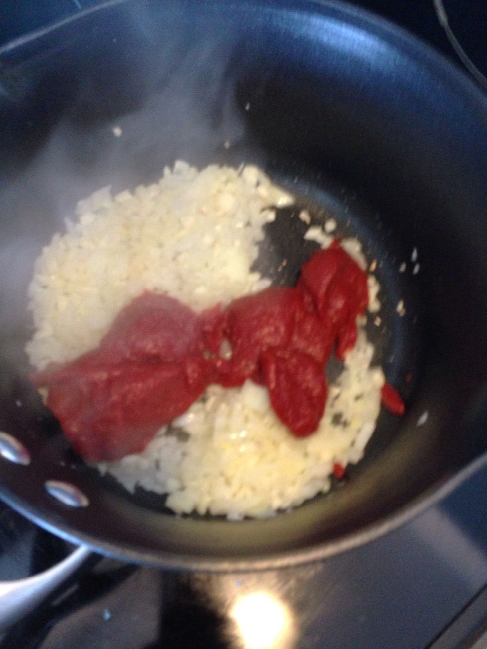 Add the tomato paste