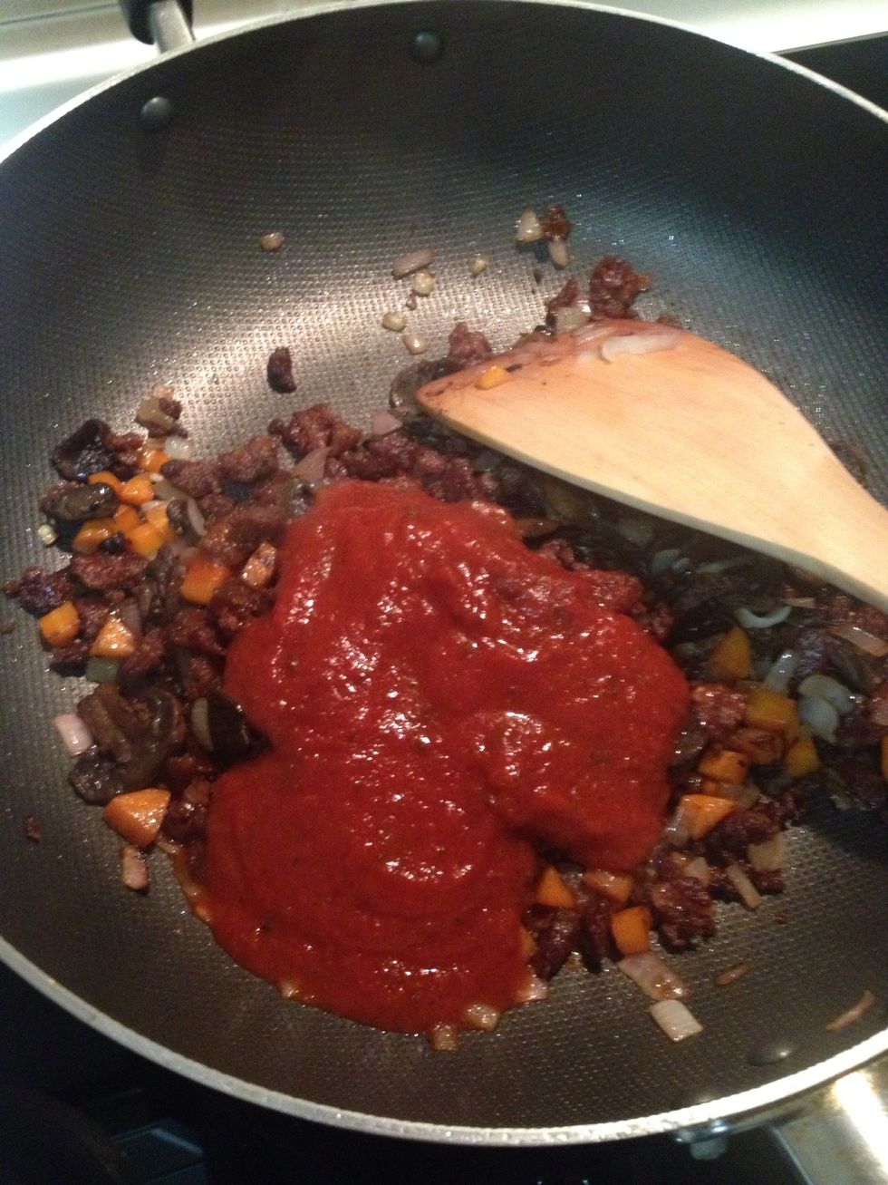 Add the tomato paste.