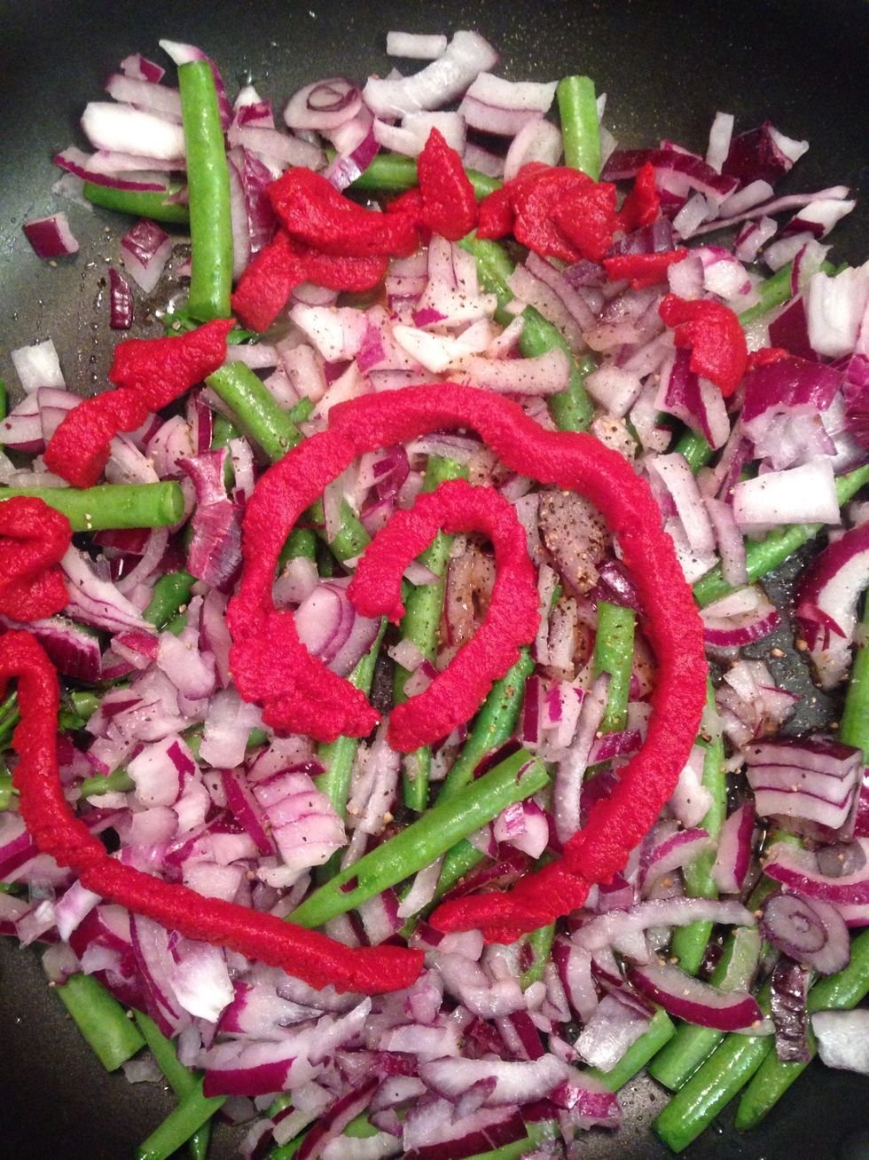 Add the tomato paste