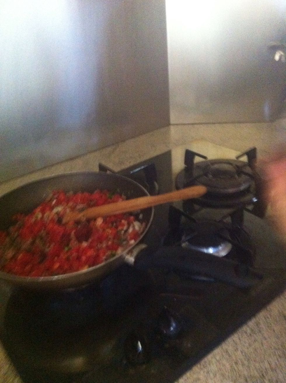 Add the tomato paste