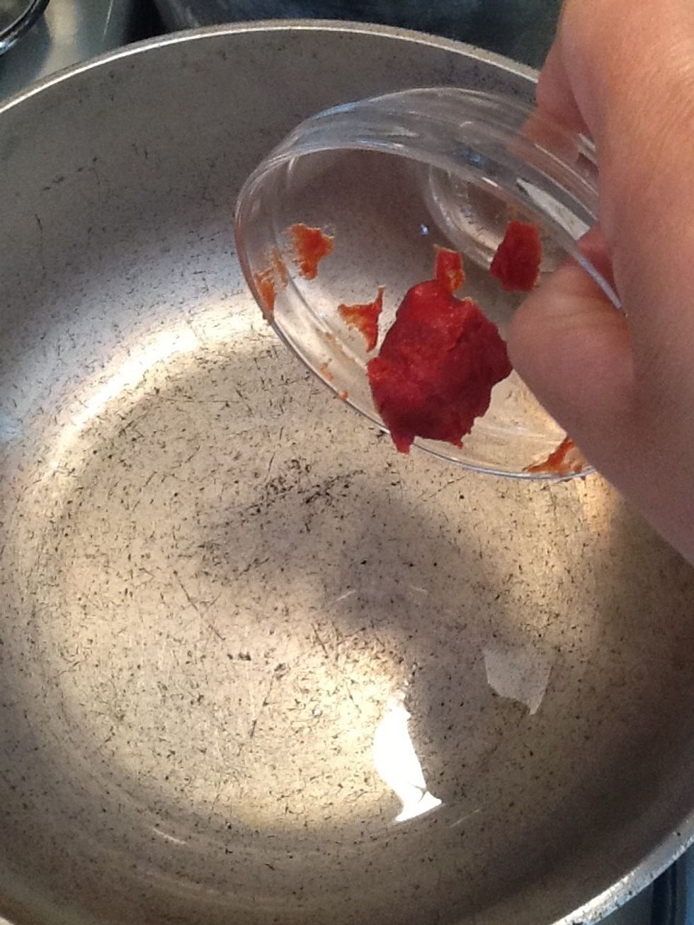 Add the tomato paste