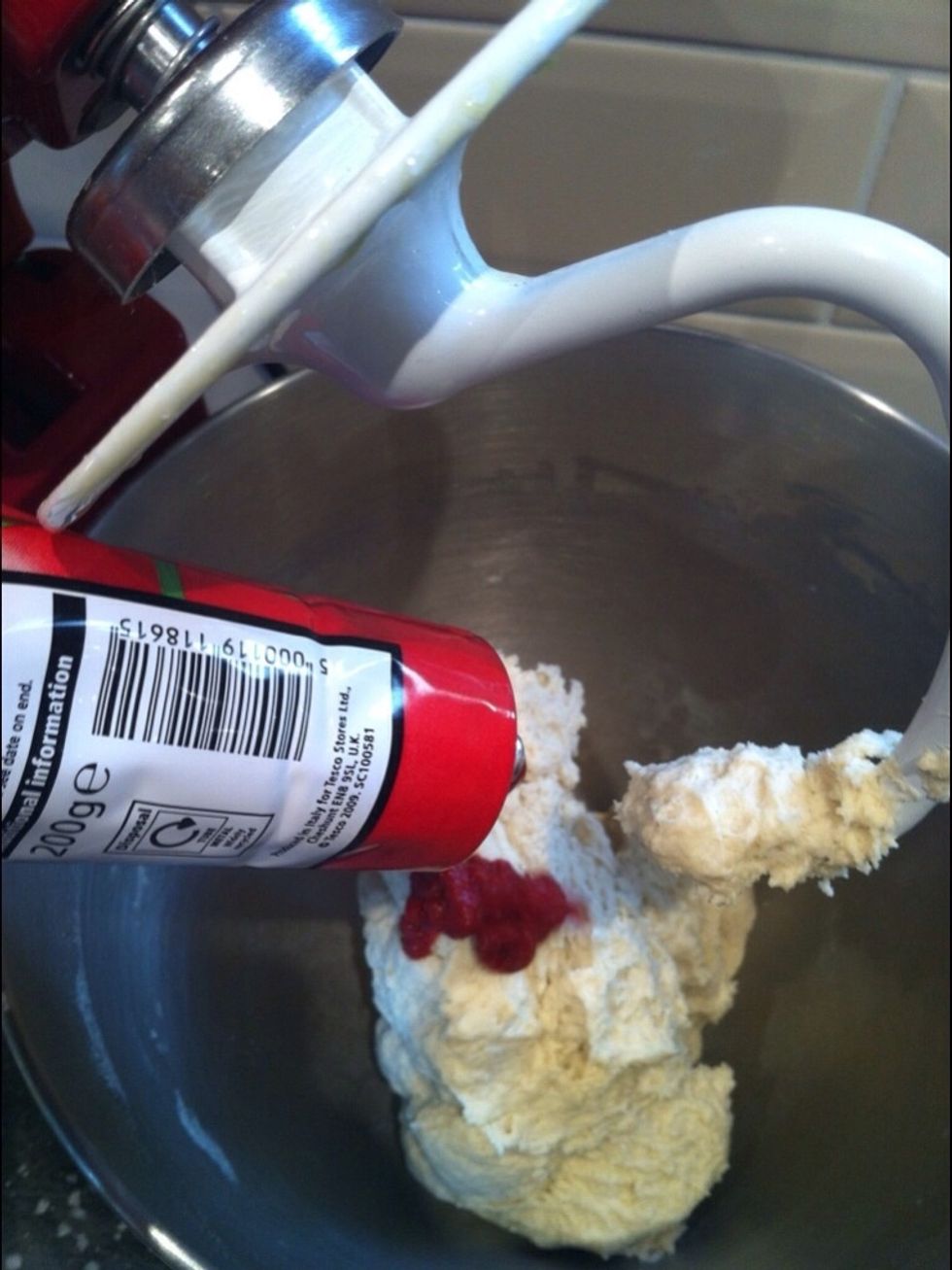 Add the tomato pur\u00e9e and mix again slightly until combined