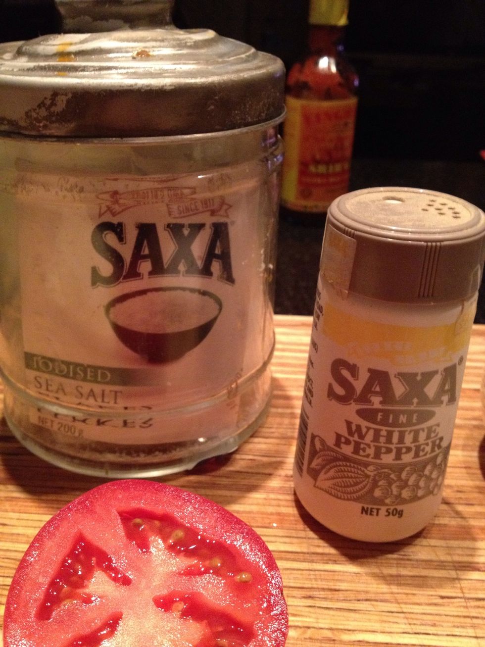 Add the tomato salt and pepper