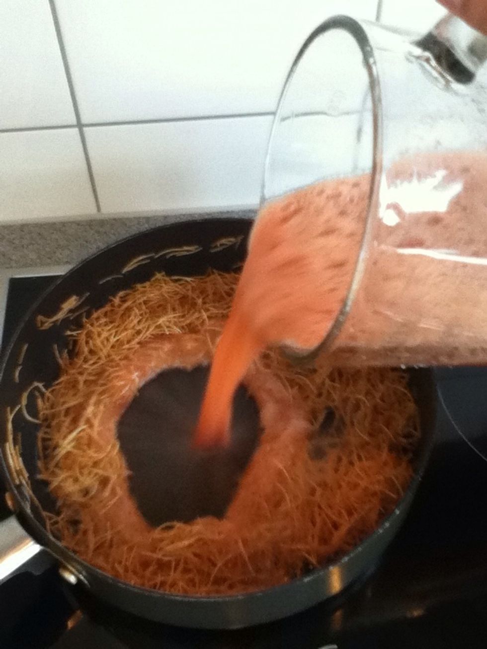 Add the tomato sauce, that you make before .