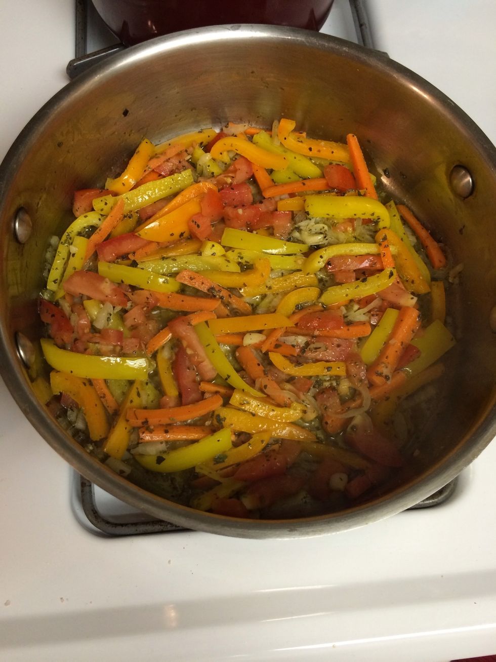 Add the tomatoes after 5 mor min. And then let simmer on Low for 15 min