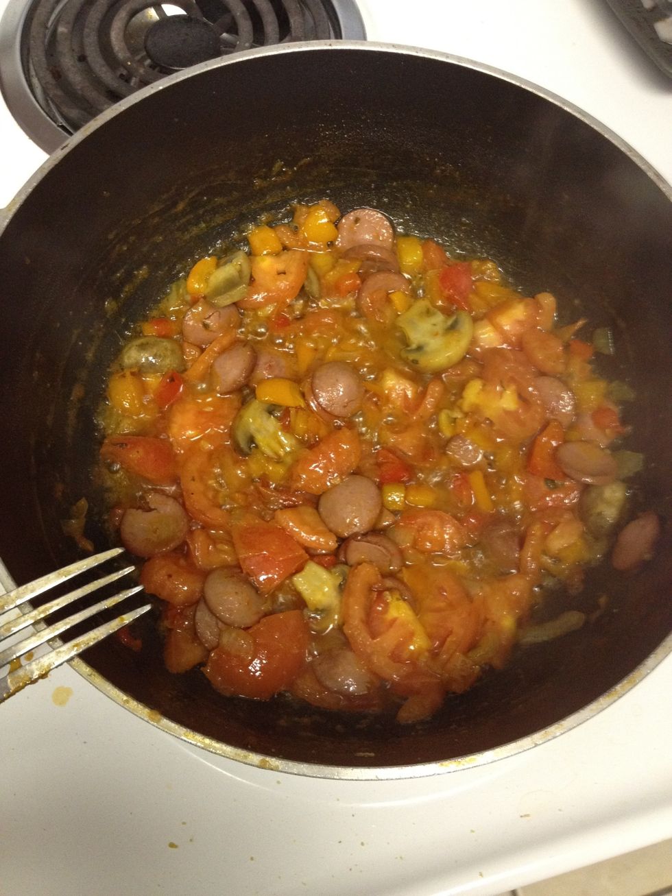 Add the tomatoes and wait until you see it is getting " redish" to add water