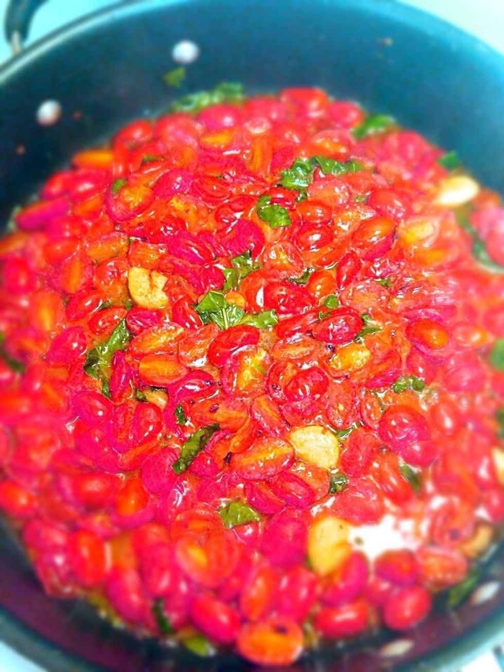 Add the tomatoes, basil, salt and pepper cook for 5 minutes