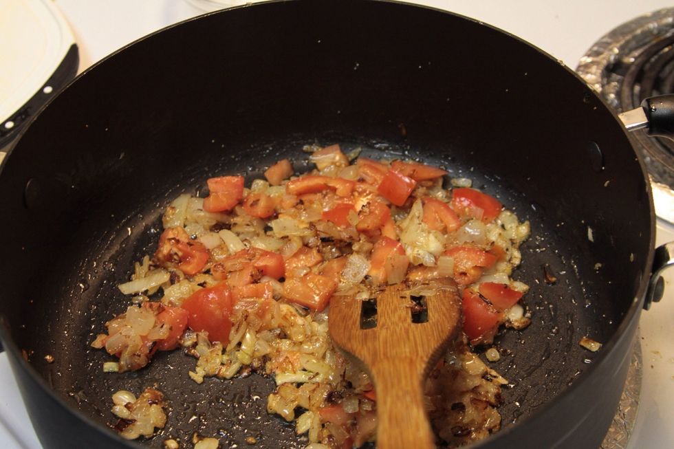 Add the tomatoes to pan and stir fry for 3 min