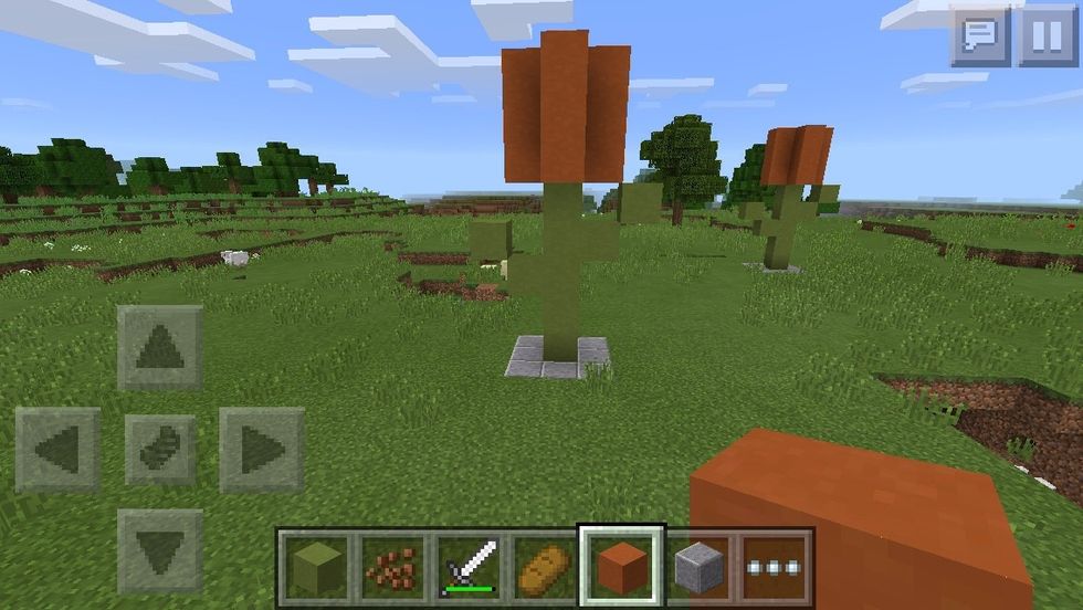 Add the tulip flower top to the top it is 3 high