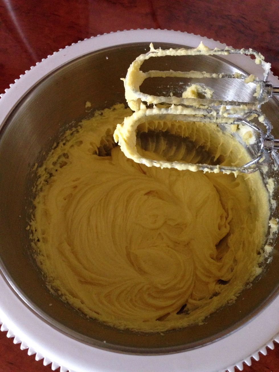 Add the vanilla and the eggs one at a time and continue beating until pale