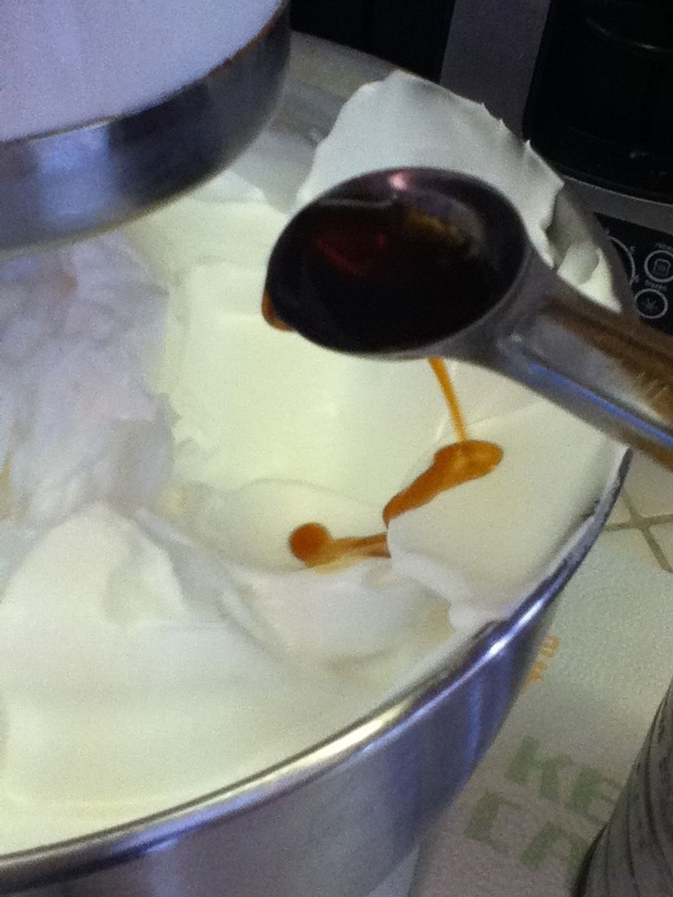 Add the vanilla extract and beat slowly to blend it.
