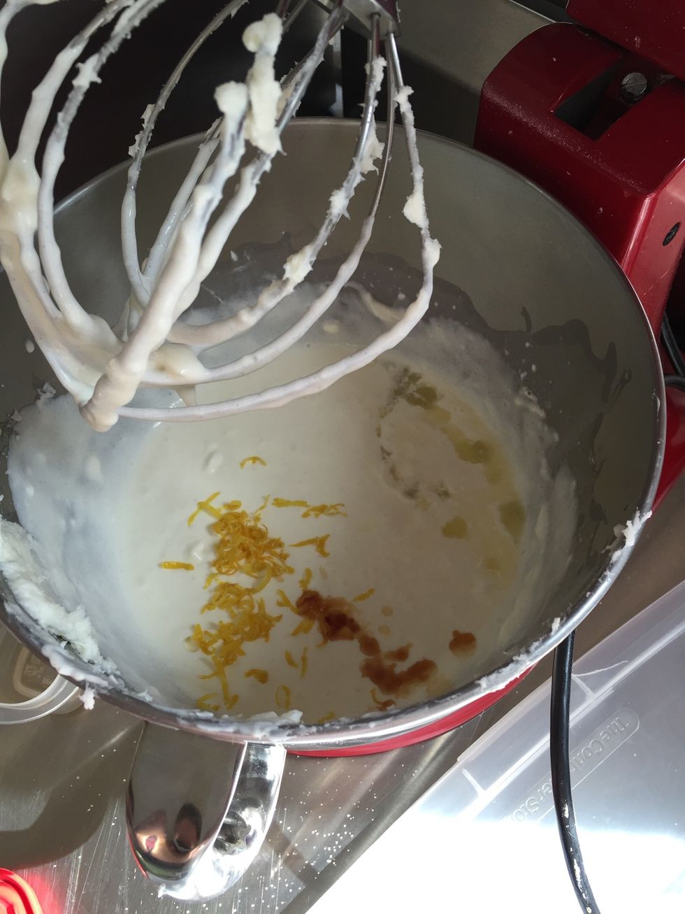 Add the vanilla, lemon juice, and lemon zest and beat until just thick and smooth.