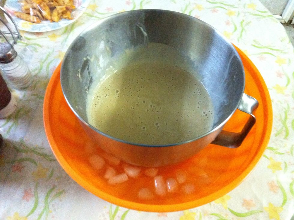 Add the vanilla, stir it in. Place the bowl in a bigger bowl filled with ice water. This stops the cooking process, cools it quicker and makes sure the eggs dont curdle. Cover the surface with plastic